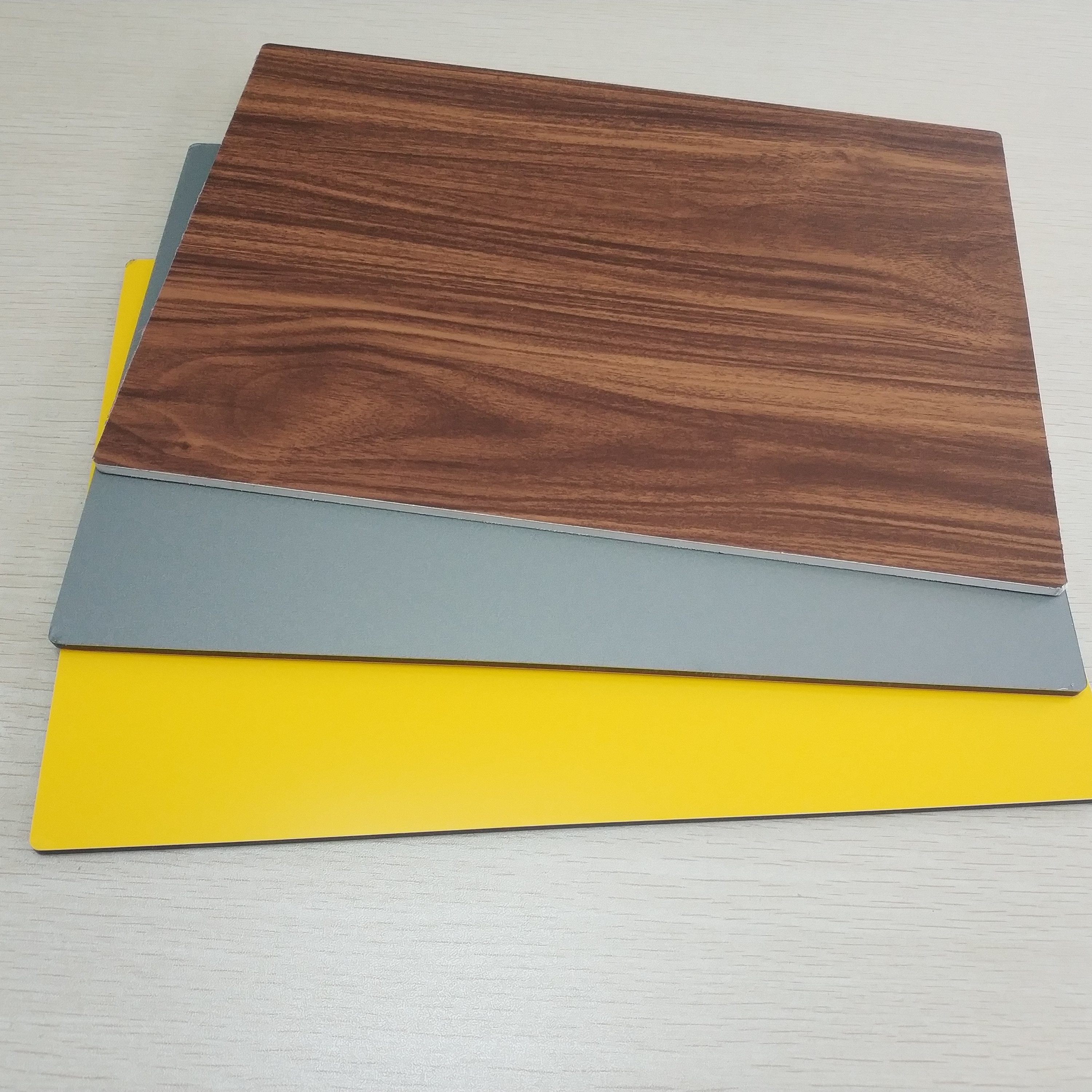 China Circular Cladding Wood Grain Aluminum Composite Panel Embossed Surface Density 2.5% wholesale