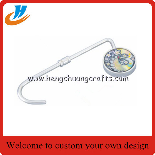 China Bag Hanger Hook/Bag Hanger Keychain customized from hengchuang crafts factory in Shenzhen wholesale