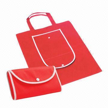 China Promotional Foldable Nonwoven Shopping Bag with Self Packaging and Plastic Button Closure  wholesale