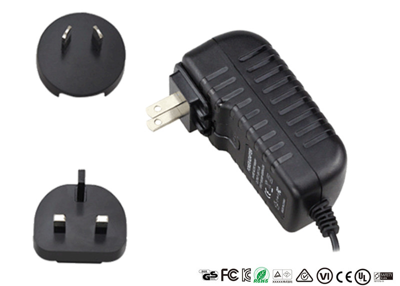 China 15W Interchangeable Plugs Universal Travel Adapter 15V 1A Switching Adapters wholesale