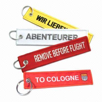 China Embroidered keychains/key fobs, with â€œremove before flightâ€ logo  wholesale