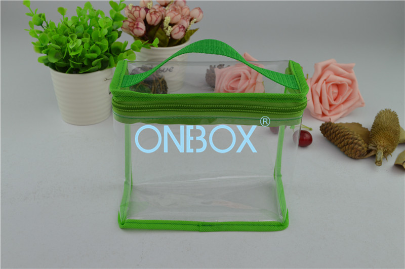 China Fashion Carrying Transparent PVC Zipper Bags With Green Borders / Handle wholesale