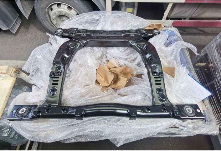 The black front subframe of steel-aluminum mixed structure of Geely Geometry A is used for car body parts.
