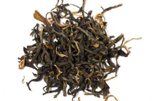 China Hair Care Golden Yunnan Black Tea , Double - Fermented Black Gold Tea wholesale