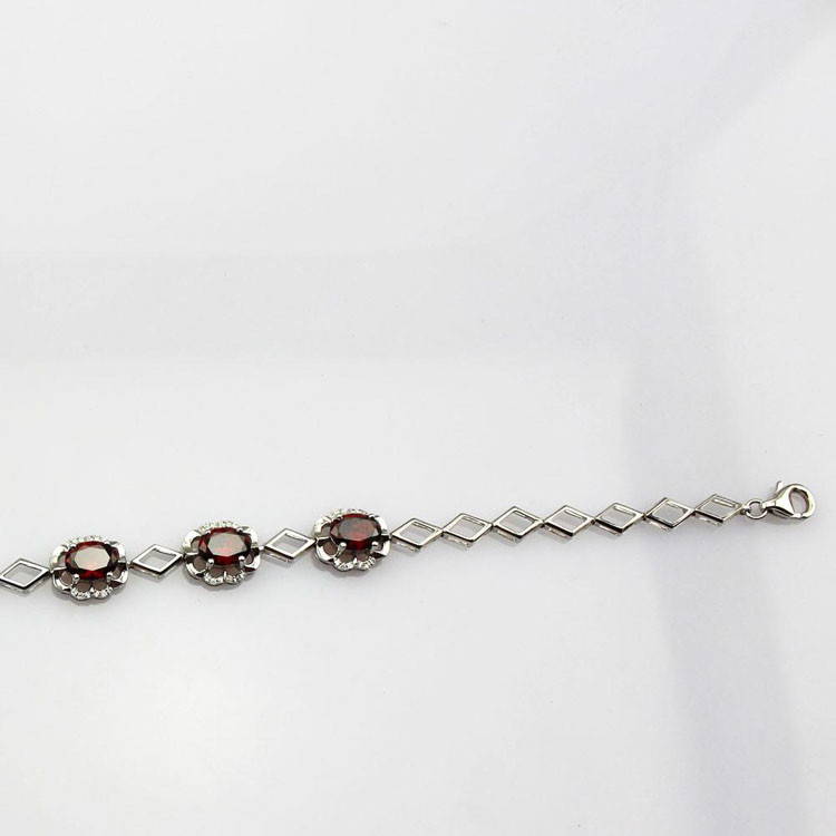 Sterling Silver 6x8mm Created Garnet and Clear Cubic Zircon Link Tennis Bracelet (H012)