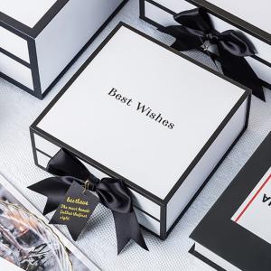 China Rigid White Magnetic Cardboard Gift Boxes With Black Rim And Ribbon Bow wholesale
