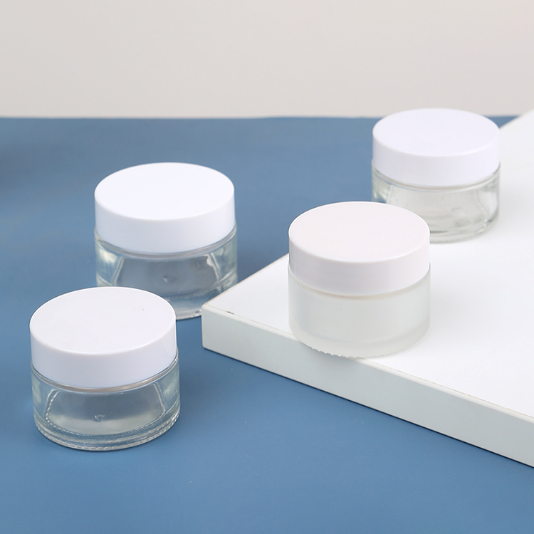Stock Luxury Skin Care Glass Jar 50g Empty Frosted Cosmetic Packaging with Black Lid and Glass Bottle Plastic Cap White Disc