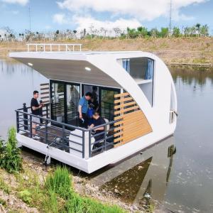 China Luxury Floating Pontoon Houseboats With Living Room Amenities Included wholesale