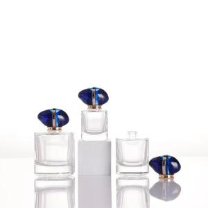 China 50ml 100ml Selling Clear Glass Perfume Bottle With Customized Lid wholesale