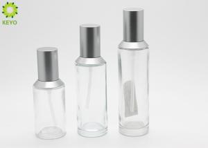 China Sloping Shoulder Clear Glass Pump Bottles 40ml 60ml 80ml 100ml For Cosmetic Packaging wholesale