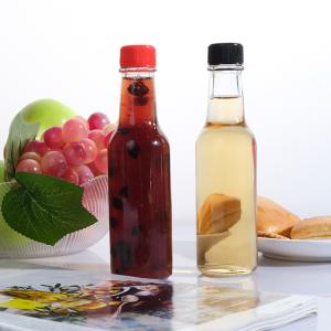 China 5oz 150ml Round Hot Sauce Bottles Glass Chili Sauce Bottle wholesale