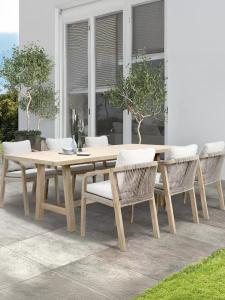 China Pastoral Style Teak Wood Table And Chair Luxury Woven Rope Outdoor Furniture For Garden wholesale