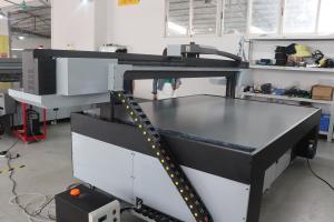 China Inkjet Digital Flatbed LED UV Printer Sturdy Flat Bed UV Printer wholesale