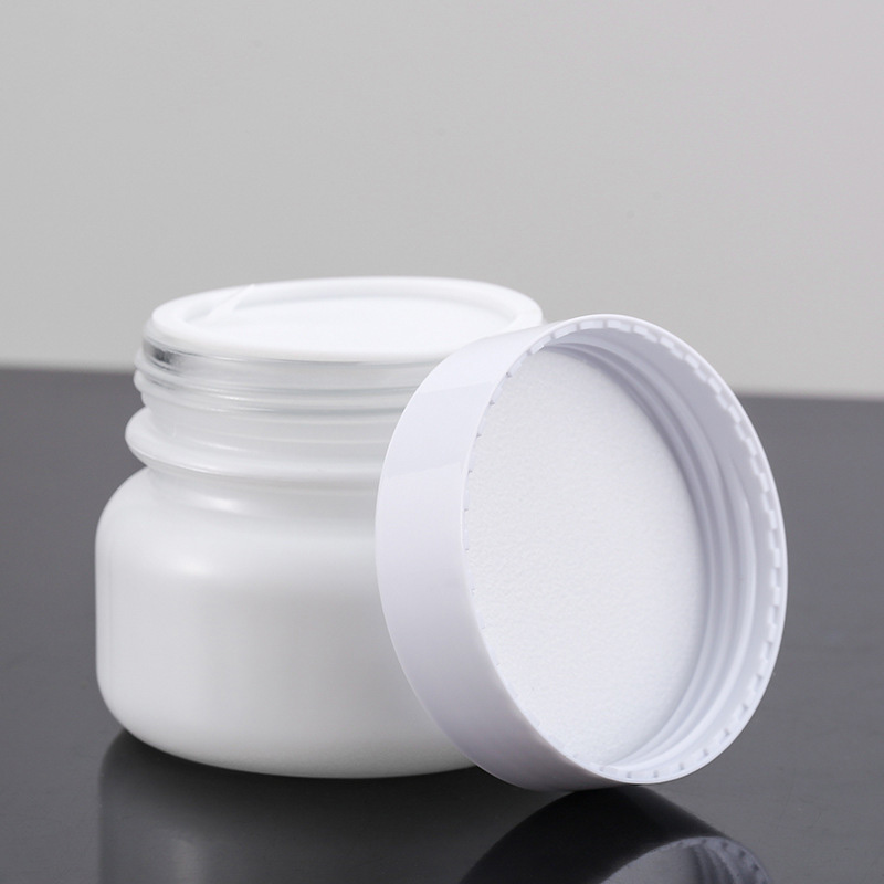 Stock Luxury Skin Care Glass Jar 50g Empty Frosted Cosmetic Packaging with Black Lid and Glass Bottle Plastic Cap White Disc