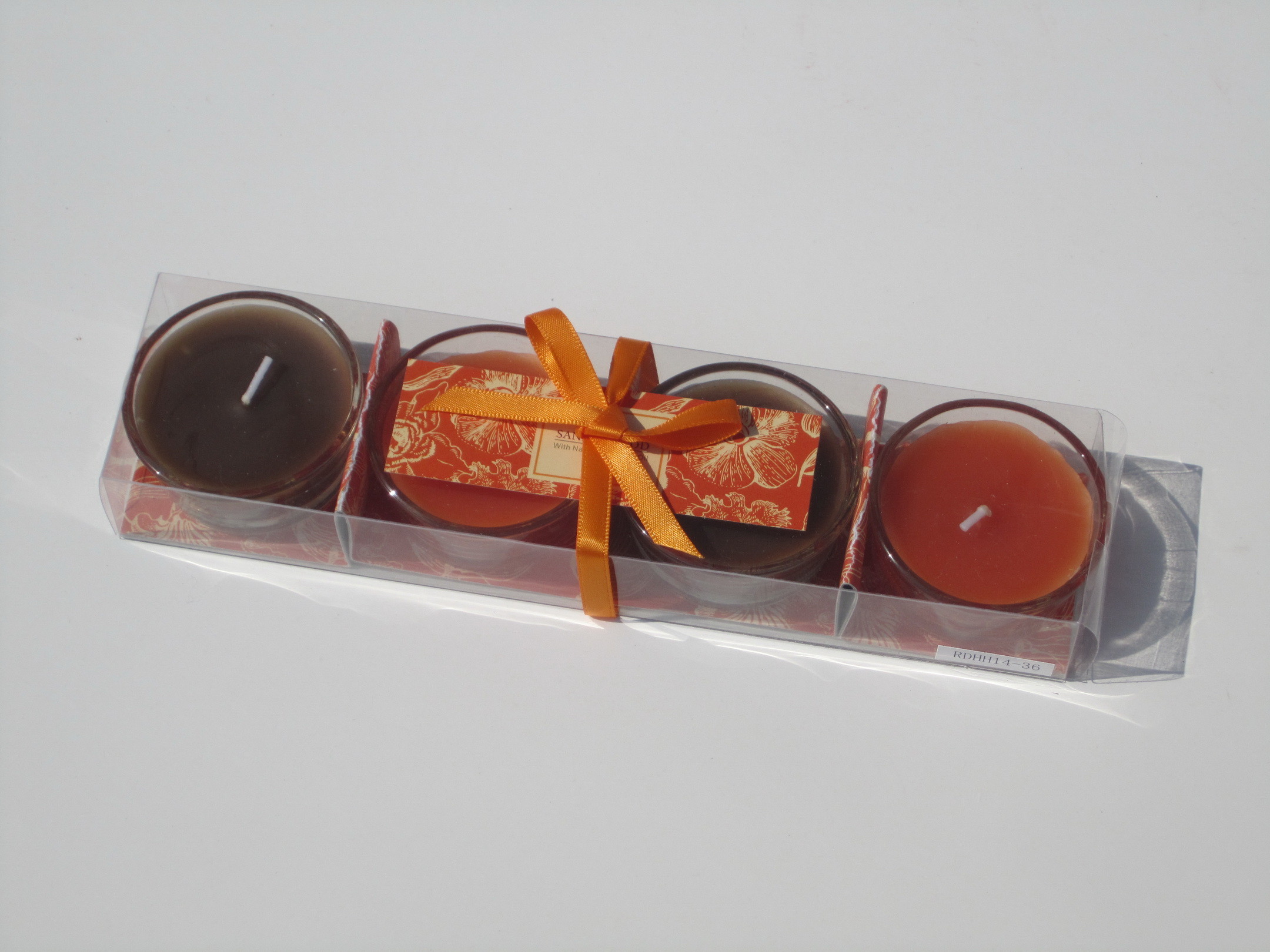 4pk Orange & Brown scented assorted glass candle with printed label,ribbon decor and packed into clear box