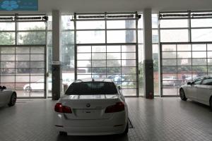 China UV Proof Residential Tempered Glass Sectional Overhead Garage Door wholesale
