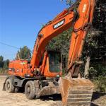 Low price 22 tons used Korean wheel excavator Doosan DX 210W-7 with lower