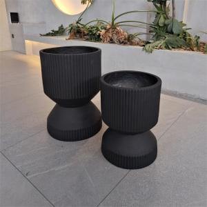 China Round Minimal Texture Fibre Clay Plant Pot Lightweight In Black wholesale