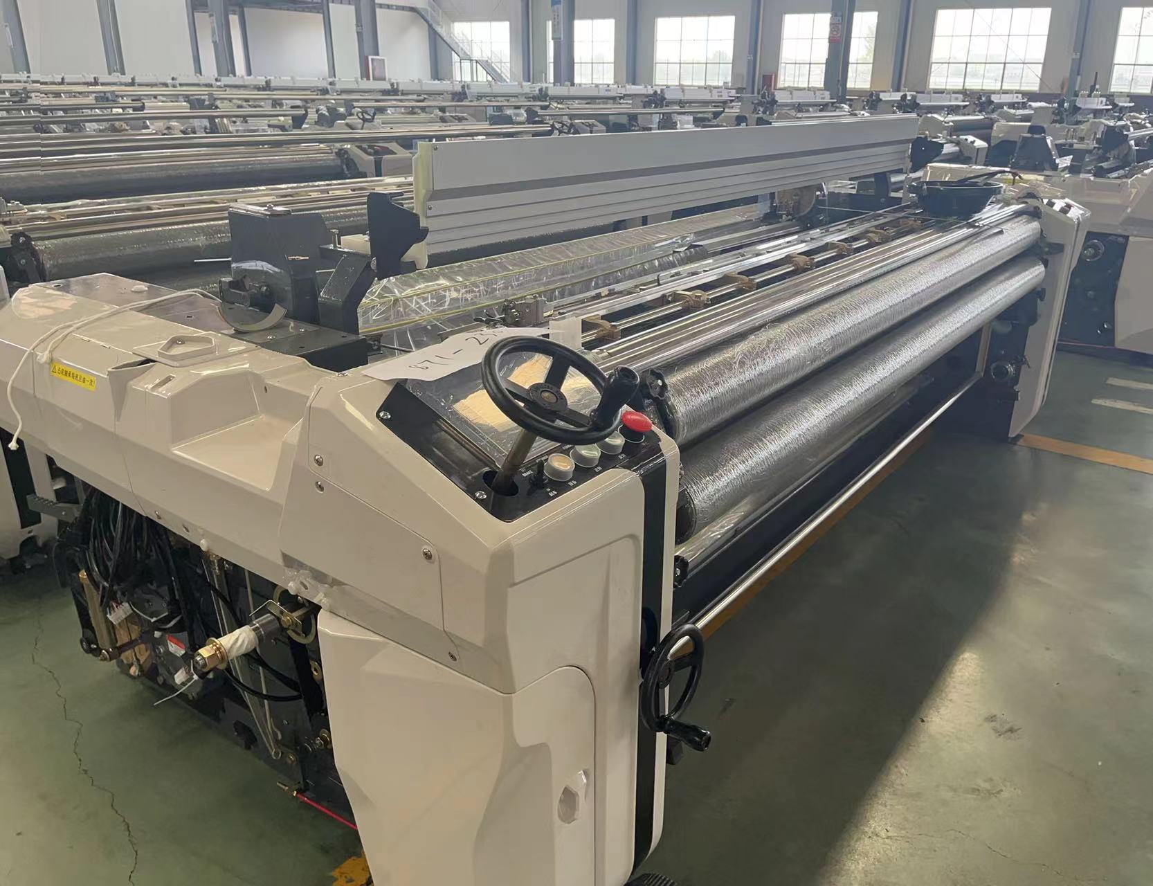 High Speed High Density Water Jet Weaving Textile Loom with Cam Shedding for Polyester Fabric.