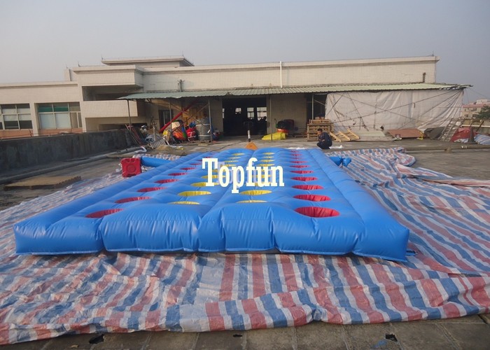 OEM 8*4m PVC Tarpaulin Inflatable Running Sport Games With Many Red Hole Obstacles