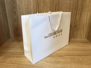 China 250gsm Recycled ODM White Paper Shopping Bags With Handles wholesale