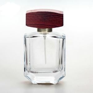 China 50ml Clear glass perfume bottle with cap and pump spray collarwith wooden caps wholesale