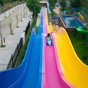 China Large Aqua Park Equipment Outdoor Rainbow Waterslide For Adults wholesale