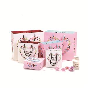 China Coated Printed Paper Bags / Shopping Black Pink Paper Bags With Handles wholesale
