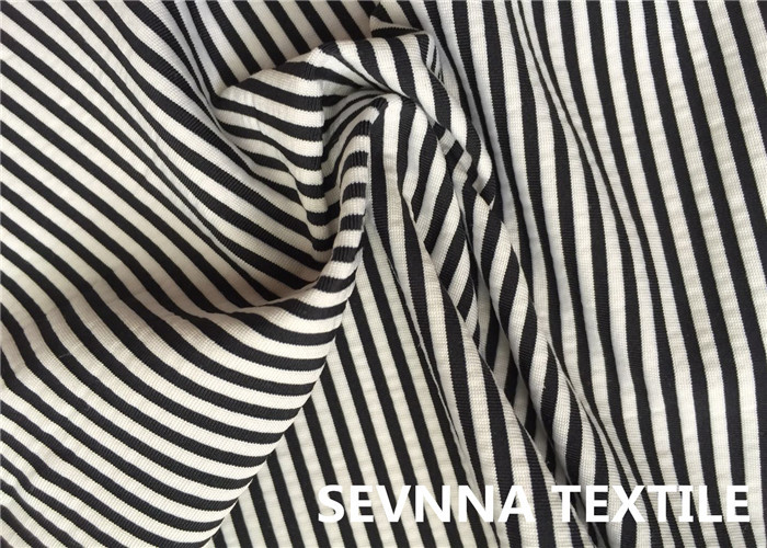 Paper Print Warp Knitted Recycled Polyester Fabric 4 Way Stretch 180gsm