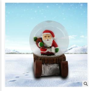China New creative promotion gift christmas santa clause resin led snow glass ball event supplie wholesale