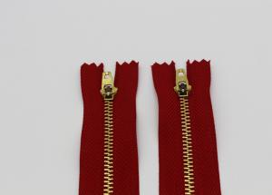China Adhesive Normal Brass Teeth Heavy Duty Metal Zippers Red Tape For Jeans / Pants / Garments wholesale