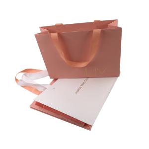 China Clothing Packaging Custom Printed Gift Bags , Paper Merchandise Bags wholesale