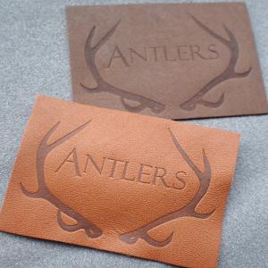 China Customized Hot Stamped Antique Copper Embossed Leather Patches wholesale