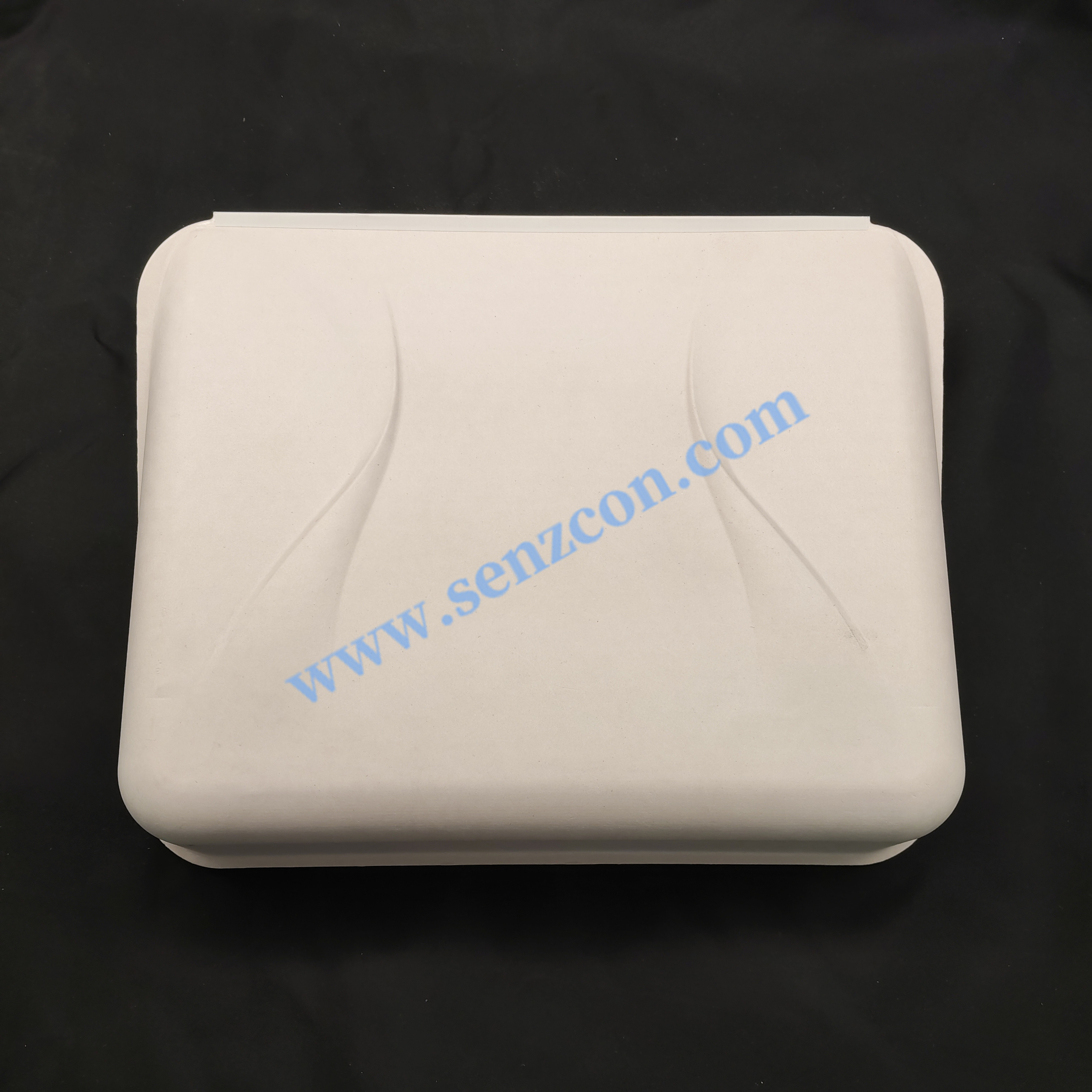 The paper-plastic packaging for high-end beauty instruments is made by combining plant fibers through wet pressing. It features an embedded inner