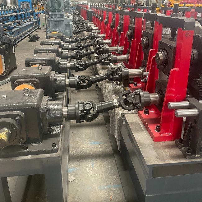 OEM ODM C Purlin Roll Forming Machine Speed Servo Following Cr12Mov Quenched Cutter