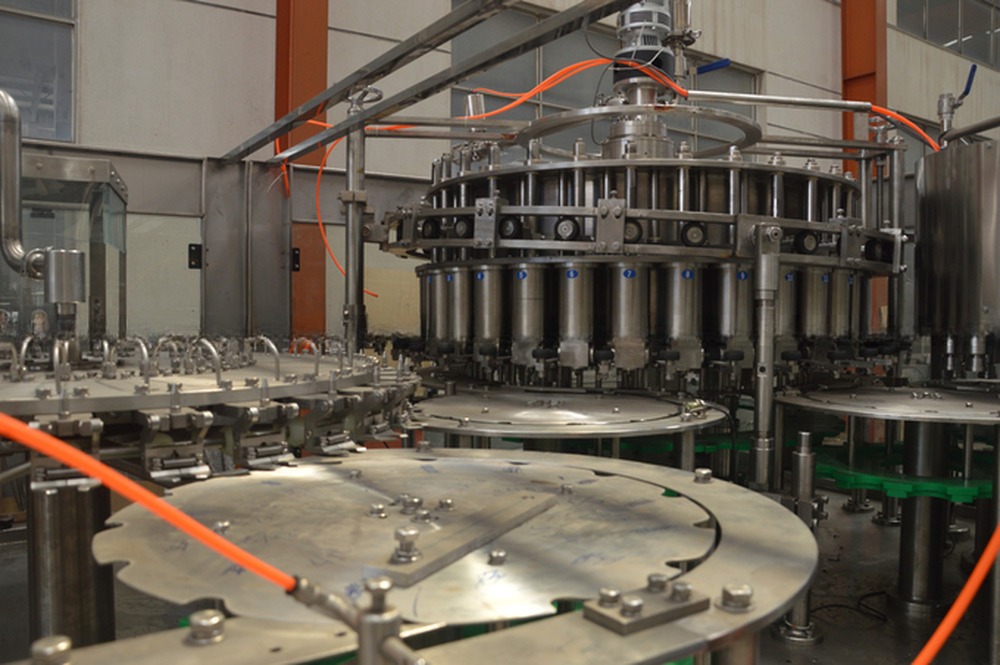 Easy to Operate 40 Heads 3 in1 Bottle Filling Machine Water Bottling and Capping Machine