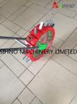 Hands Pushing Small Manual Grain and Beans Seeder Sell