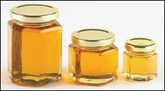 China hexagonal glass jars for honey wholesale
