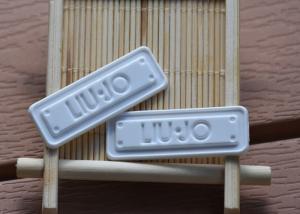 China Degradable 2mm garment TPU Clothing Labels With Mould Embossed Logo wholesale