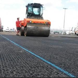 China Highways / Railways / Airports Fiberglass Geotextile Geogrid Bitumen Coated Glass Fiber Geogrid wholesale