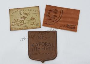 China Brown PVC TPU Stitched On Jeans Leather Label SGS Embossed Leather Tags wholesale