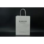 China Durable Tea Packaging Paper Bags Lightweight White Gift Bags With Handles for sale