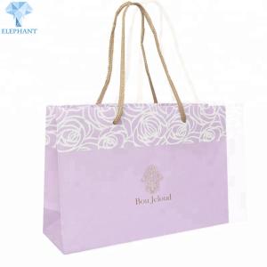 China Portable Kraft Paper Bags With Rope Handles Glossy Lamination wholesale
