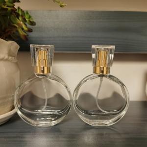 China Smooth Surface Oblate Glass Perfume Bottle 30ml 50ml 100ml wholesale