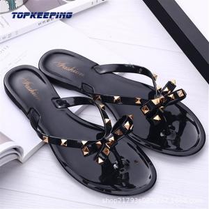 China PVC Summer Black Flat Sandals Womens With Bow Rivet wholesale
