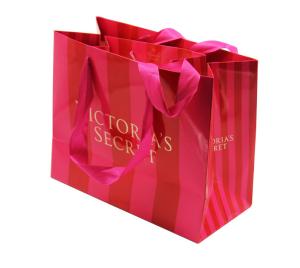China Custom Boutique Paper Gift Bags Packaging With Gold Foil Stamping Logo Suppliers wholesale