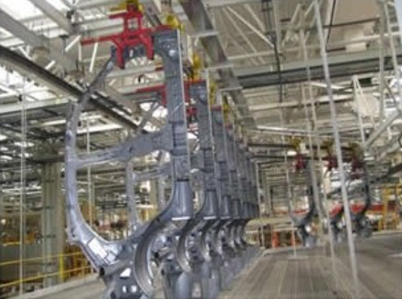 Self-propelled trolley conveyor