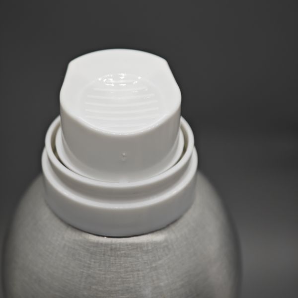 Detailed view of shaving foam valve components