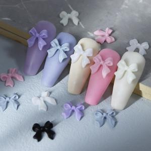 China Holiday Decoration 30 Boxed Resin Bow Nail Art Accessories with Black Ribbon Printed Japanese and Korean Nail Art Stickers wholesale
