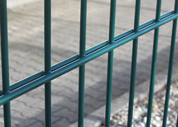 The detail of green powder coated double wire mesh fence